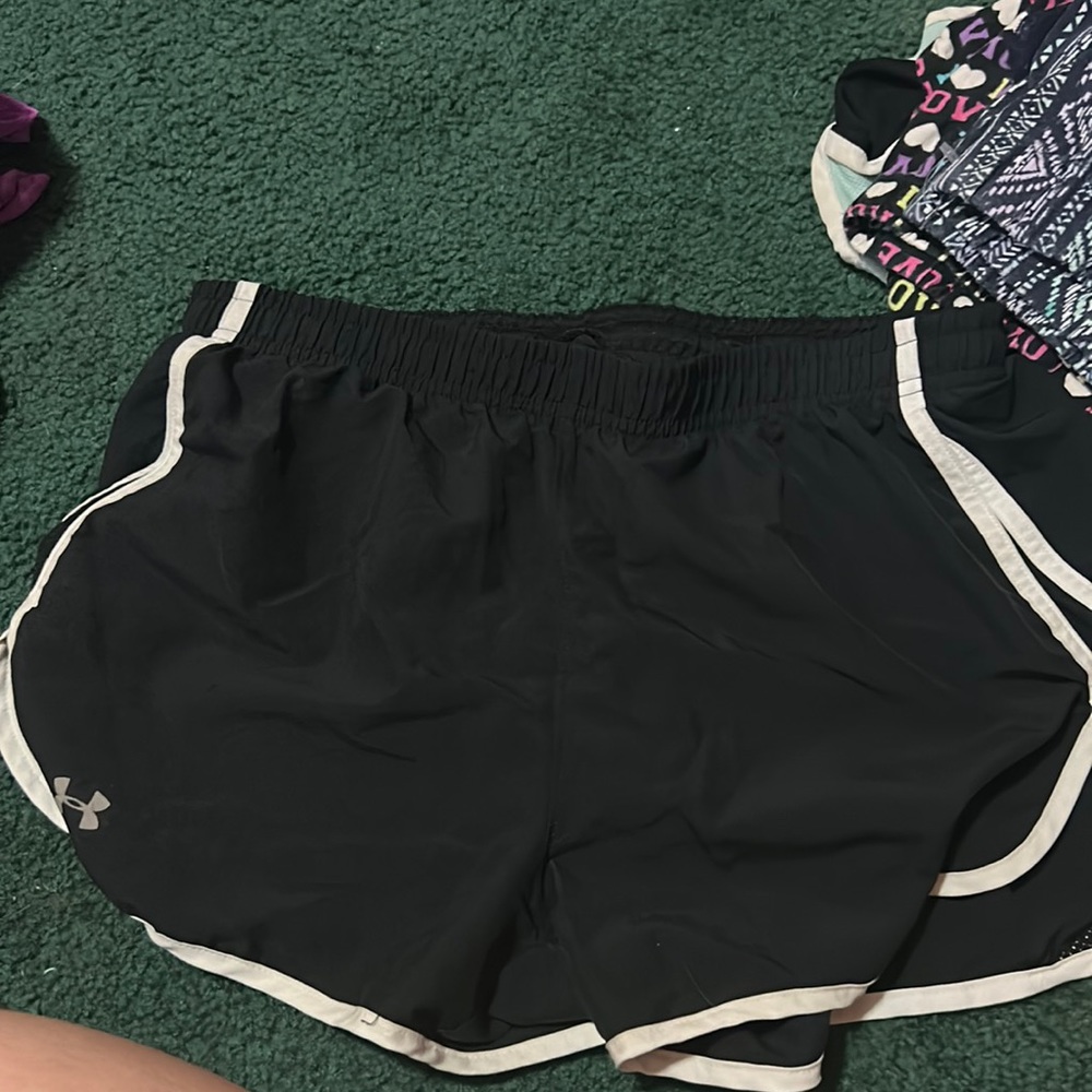 Under armor shorts,black and white size medium